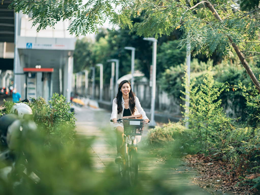 Woman on bike in city