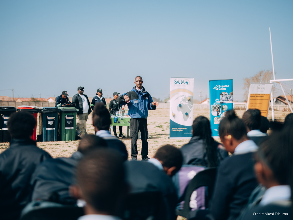 Lehlohonolo Jack speaking in front of a crowd